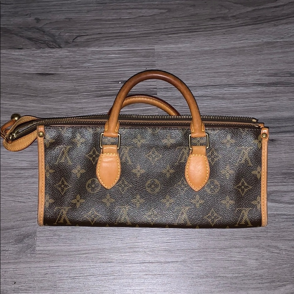 Authentic Louis Vuitton Purse (triangle shaped)